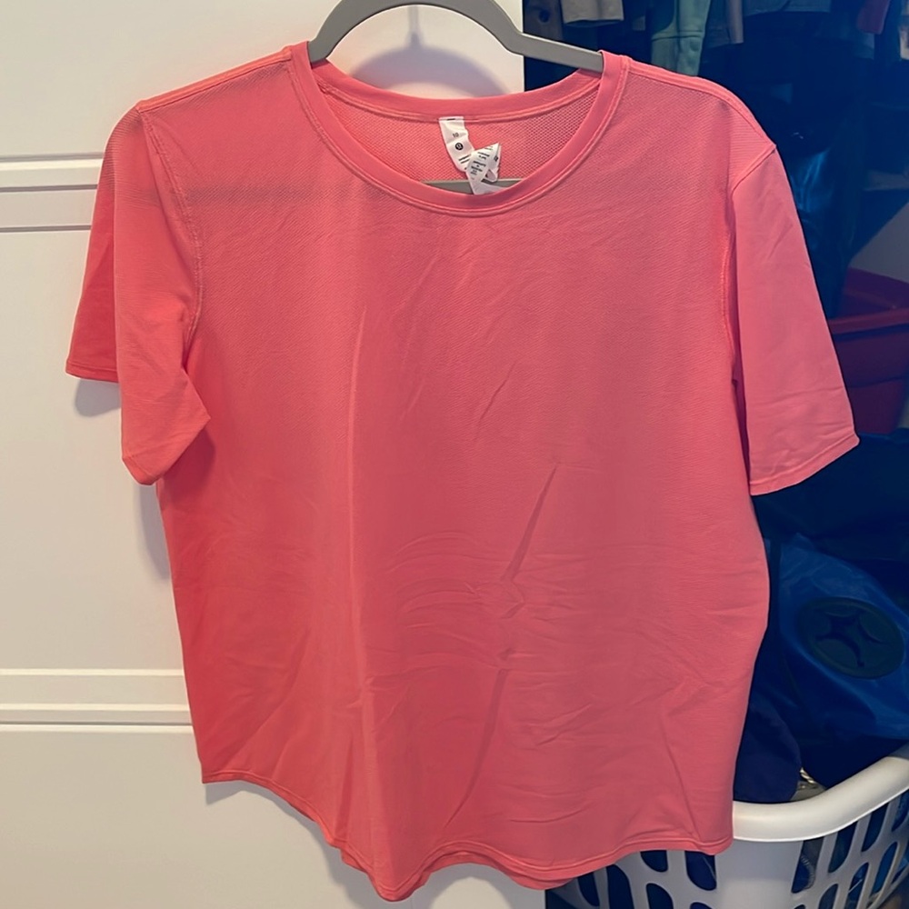 Coral colored lululemon shirt size 10